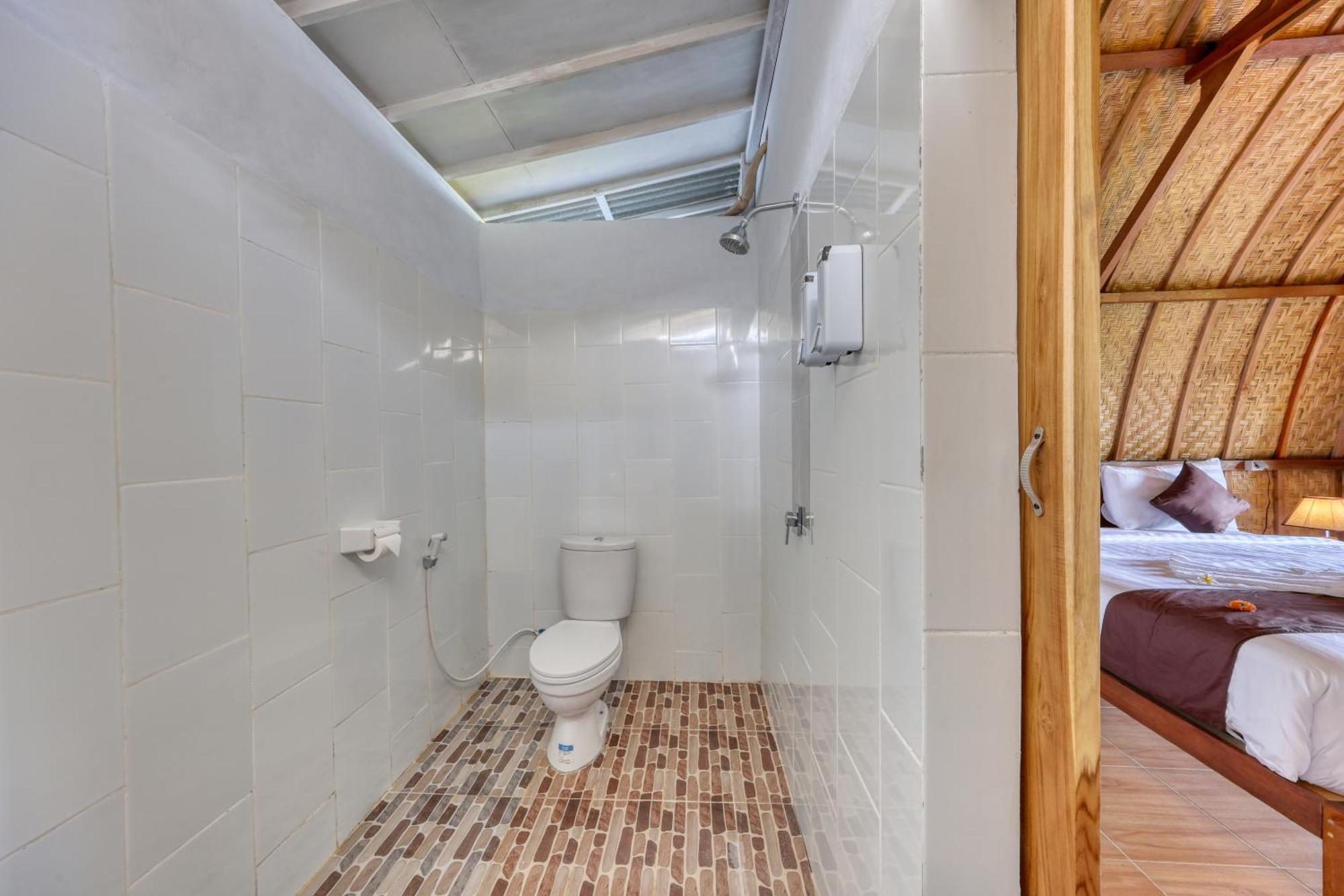 D Sebuluh Bungalow Batumadeg Стая снимка